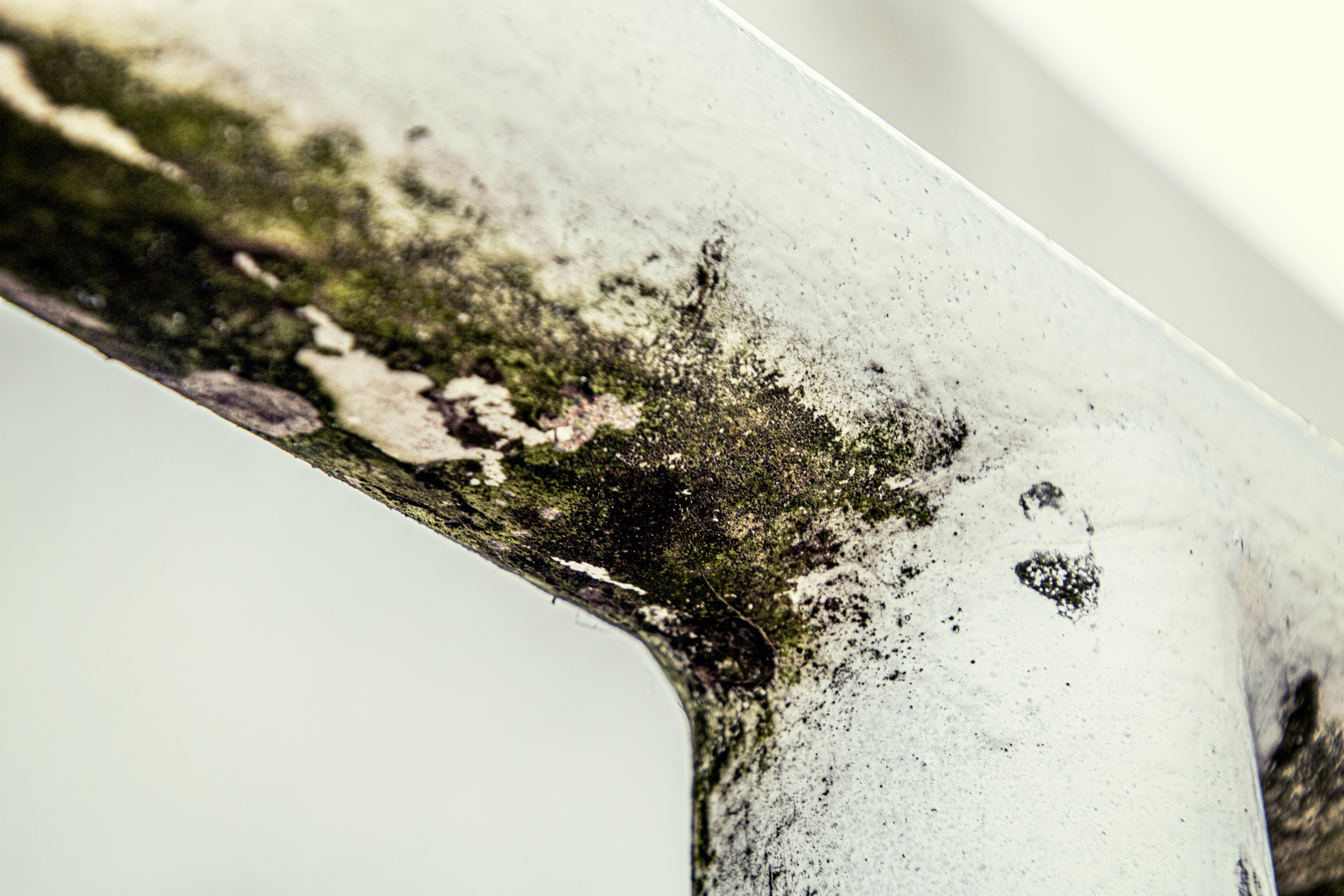 Close-up of a metal surface with rust and corrosion